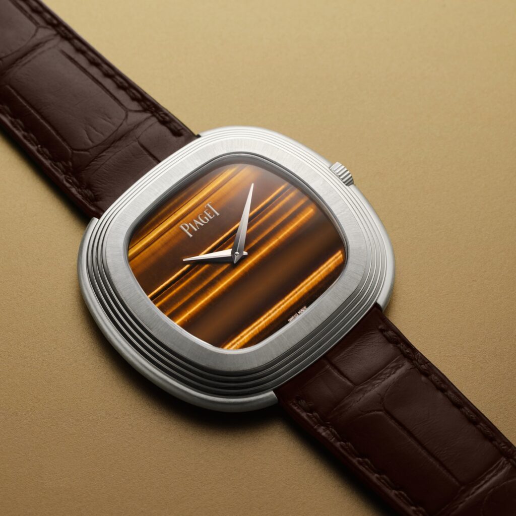 Los relojes más sorprendentes de Watches and Wonders 2025 / Patricia Olivares Taylhardat, relojes, Watches and Wonders 2025, Watches, Wonders, 2025, relojería, Cartier, Tank à Guichets, preciosos, oro, platino, Piaget, homenaje, Andy Warhol, material, caja, esfera, piedra, bisel, diamantes, ojo, tigre, Hermés, elegante, Cut, rubí, pulsa, Jaeger-LeCoultre, Reverso, Tribute Monoface, brazalete, milanés, Lady Arpels Bal des Amoureux Automate, Van Cleef & Arpels, guinguette, baile, suburbios, parisinos, siglo XIX